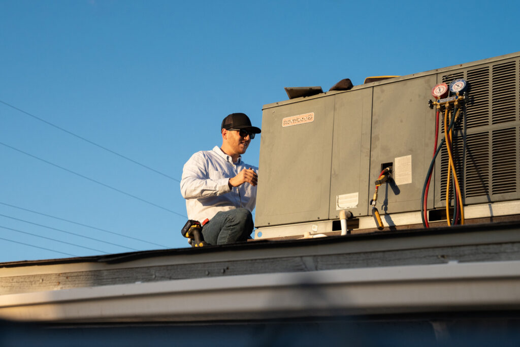 TWS alum Michael Gabhart on a roof