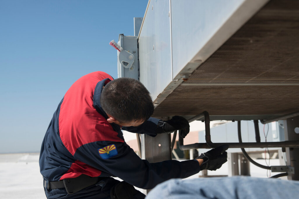 Working on HVAC unit