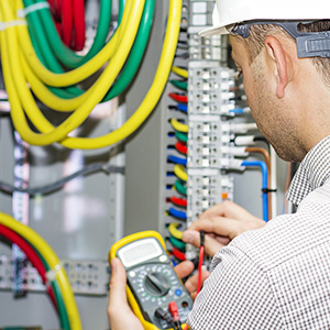 electrician checking electrical box