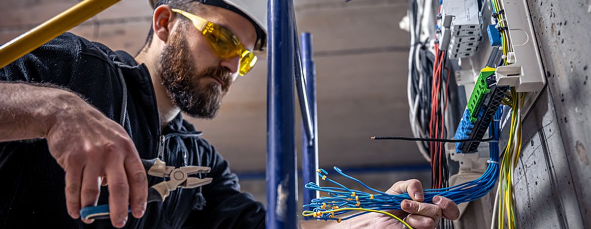 electrician fixing switchboard