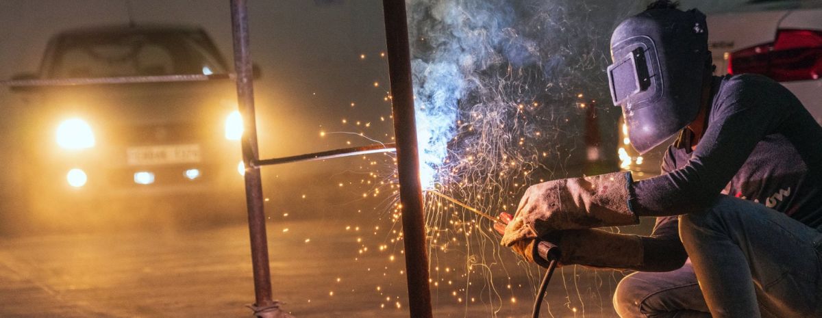 using a welding gun in a garage