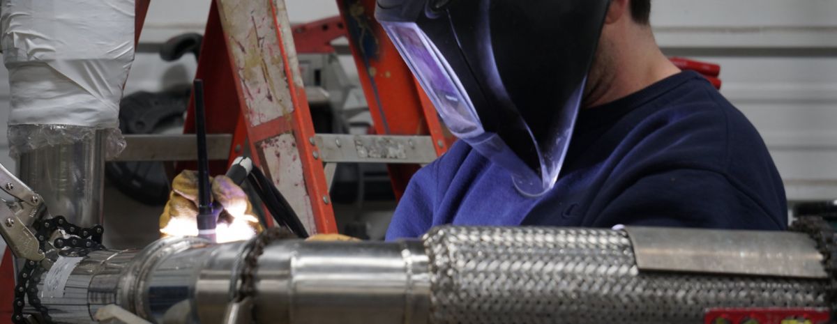 welding student working a job